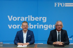 Christof Bitschi und Edi Fischer sitzend nebeneinander